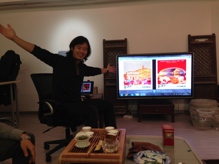 Mike Shengdu - in his studio with his designed chinese stamp